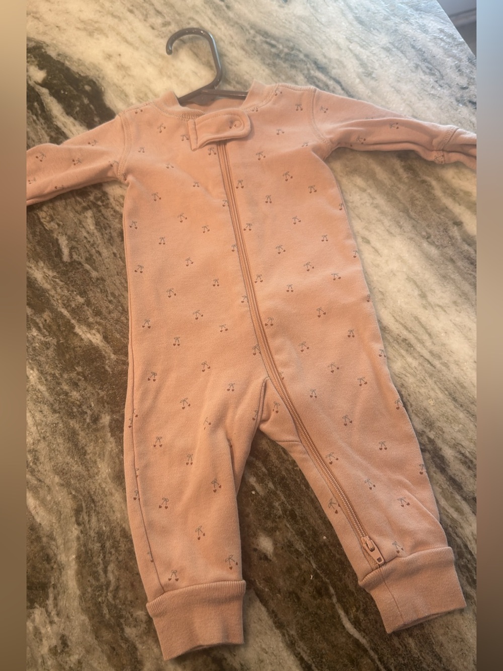 Baby Long-Sleeve Zip One-Piece in Light Pink with little cherries all over it